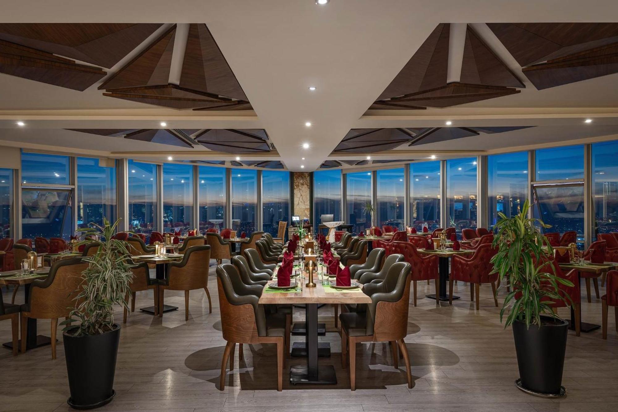 Titanic Hotel & Spa スレイマニヤ エクステリア 写真 The 360° Restaurant