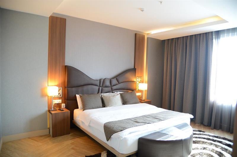 Titanic Hotel & Spa スレイマニヤ エクステリア 写真 A bedroom at the hotel